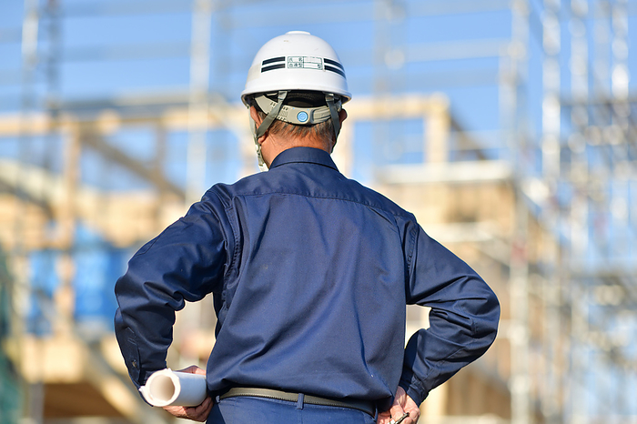 Site supervisor inspecting residential construction work