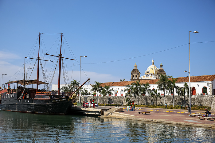 Bodeguita pier with historic ship and view to historic buildings, Old Town Cartagena, Colombia Bodeguita pier with historic ship and view to historic buildings, Old Town Cartagena, Colombia, by Zoonar Uwe Bergwitz
