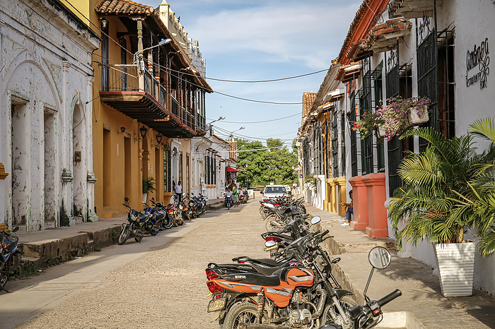 Typical street with colorful historic buildings in sun and shadow of Santa Cruz de Mompox, Colombia, Typical street with colorful historic buildings in sun and shadow of Santa Cruz de Mompox, Colombia, World Locations, by Zoonar Uwe Bergwitz