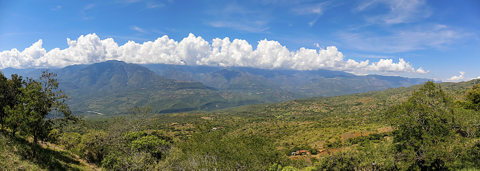 Panorama of wonderful view from Barichara, Colombia over green landscape to mountains with blue sky Panorama of wonderful view from Barichara, Colombia over green landscape to mountains with blue sky, by Zoonar Uwe Bergwitz