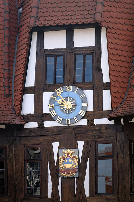 Clock at the town hall in Michelstadt Clock at the town hall in Michelstadt, by Zoonar Volker Rauch