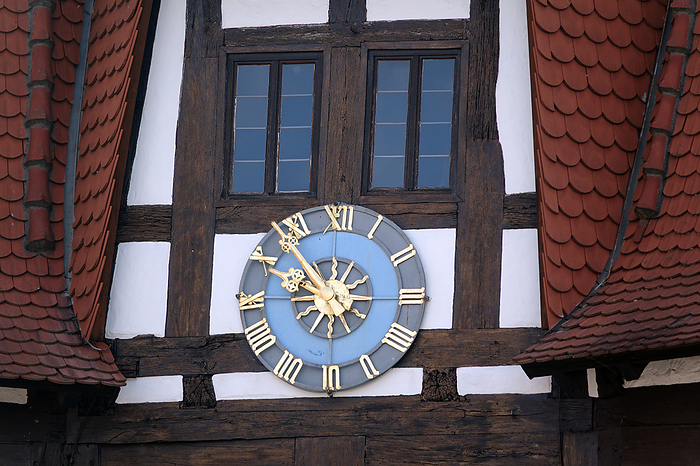 Clock at the town hall in Michelstadt Clock at the town hall in Michelstadt, by Zoonar Volker Rauch