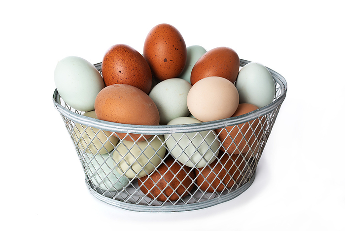 Colorful eggs in a basket Colorful eggs in a basket, by Zoonar Judith Kiener