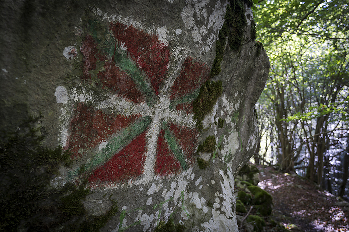 Basque flag painted on the rock Basque flag painted on the rock, by Zoonar Tolo