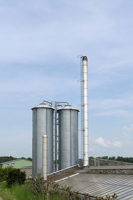 Silos and chimney Silos and chimney, by Zoonar Volker Rauch