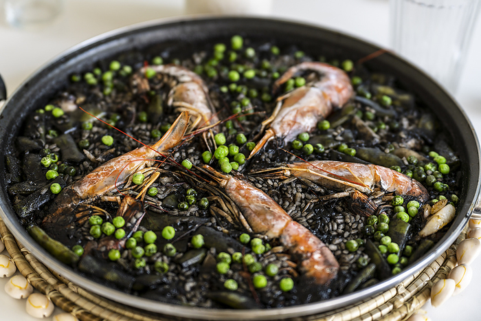 black rice paella with cuttlefish ink black rice paella with cuttlefish ink, by Zoonar Tolo