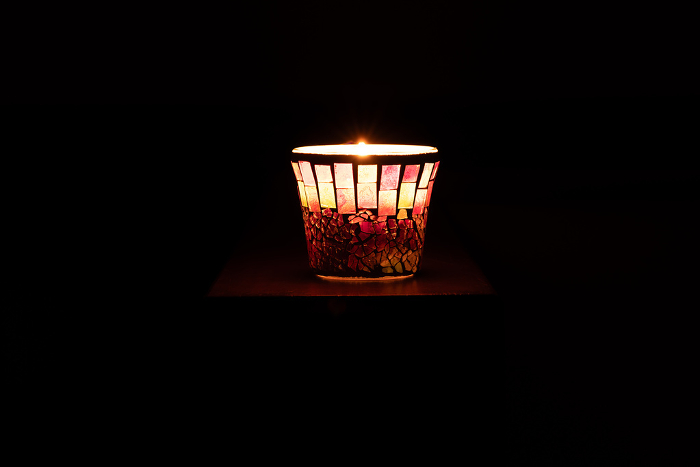 Candlelight shining in the dark