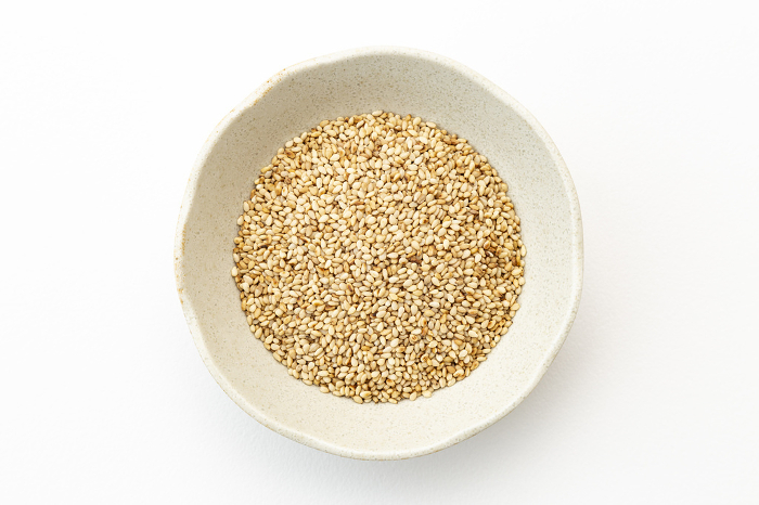 roasted sesame seeds on white background