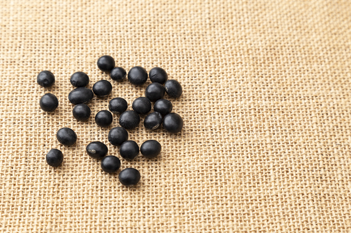 Black soybeans on a jute bag