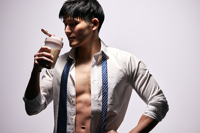 Japanese man drinking protein