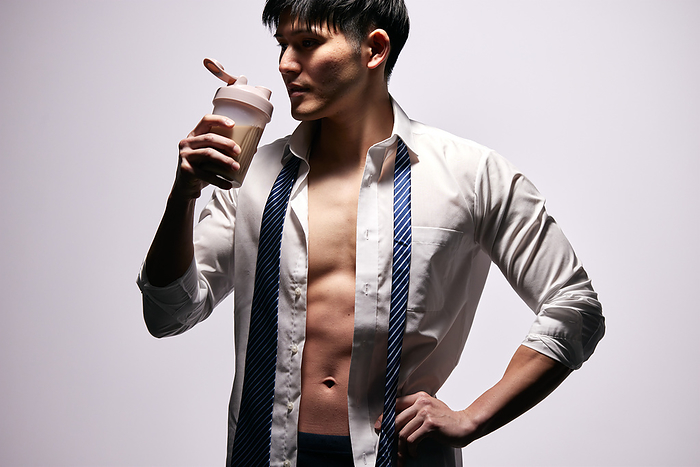 Japanese man drinking protein