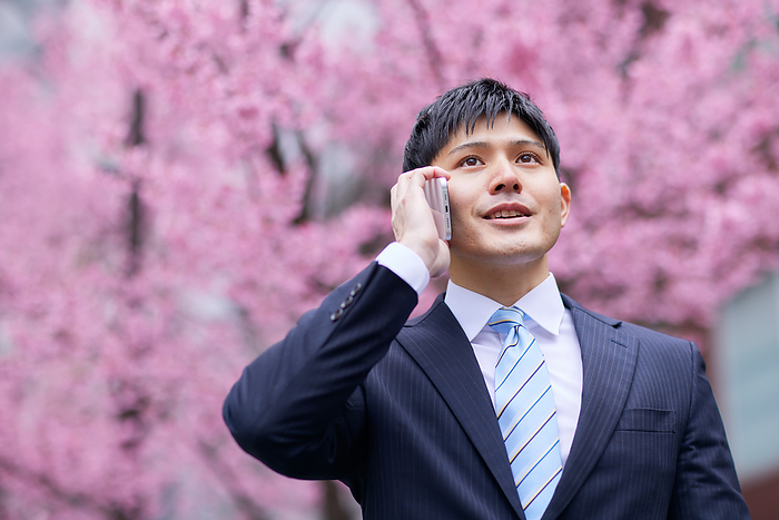 Japanese man talking on his cell phone