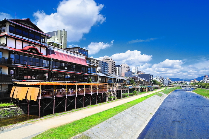 The Kamo River and the town along the Kamo River in Kyoto, Kyoto, Japan, with summer clouds spreading out. Shooting upstream from Matsubara Bridge