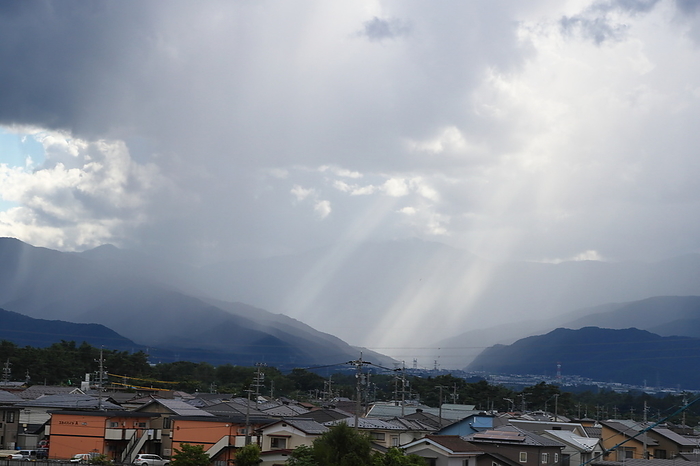 Summer evening rain column seen from Shiojiri City Shiojiri City, Nagano Prefecture, Japan