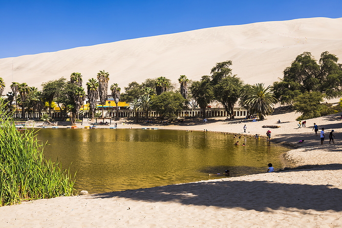 Huacachina, a sand dunes surrounded oasis village in the Ica Region of Peru Huacachina, a sand dunes surrounded oasis village in the Ica Region of Peru, South America