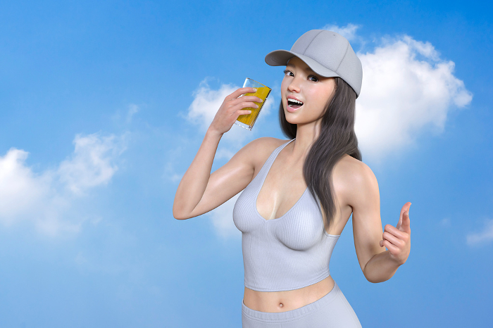 Woman drinking a drink under the blue sky after running