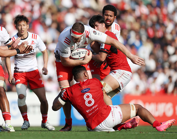 2023 24 Japan Rugby League One Rugby League One First Division BL Tokyo vs. Kobe Kobe Brodie Retallick is tackled by BL Tokyo Shannon Frizzell  front  in the second half, April 14, 2024  date 20240414  place Chichibunomiya Rugby Ground, Tokyo, Japan