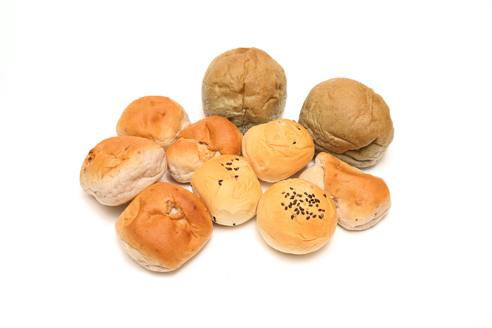 Various breads on white background