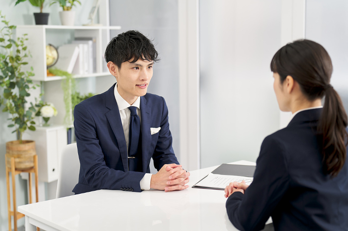 Japanese businessperson interviewing in an office (People)