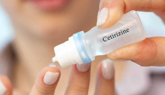 Cetirizine medical drops, conceptual image Cetirizine medical drops, conceptual image. An antihistamine used to relieve allergy symptoms, including ocular itching and redness., by Wladimir Bulgar SCIENCE PHOTO LIBRARY