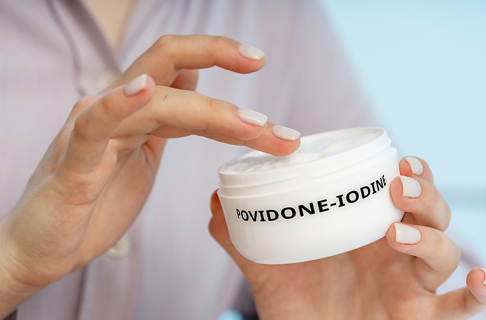Povidone iodine medical cream, conceptual image Povidone iodine medical cream, conceptual image. An antiseptic cream used to prevent infection in minor cuts, wounds, and burns., by Wladimir Bulgar SCIENCE PHOTO LIBRARY