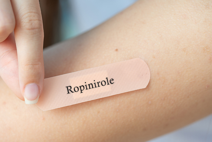 Ropinirole dermal patch, conceptual image Ropinirole transdermal patch, conceptual image. Dopamine agonist used for Parkinson s disease and restless legs syndrome., by Wladimir Bulgar SCIENCE PHOTO LIBRARY