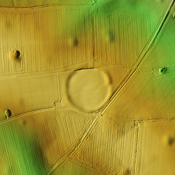 Bloodgate Hill Fort, UK, 3D LiDAR scan 3D LiDAR scan of Bloodgate Hill Fort in Norfolk, UK. The digital terrain model offers a view of the surrounding landscape without obstruction from foliage. This ancient hillfort is one of many hillforts found across the UK and dates back to the Iron Age, roughly between 700 BC and 43 AD. These hillforts served as fortified settlements or defensive structures for ancient communities, offering protection and strategic control over the surrounding territory. Image contains UK public sector information licensed under the Open Government Licence v3.0., by SIMON TERREY SCIENCE PHOTO LIBRARY