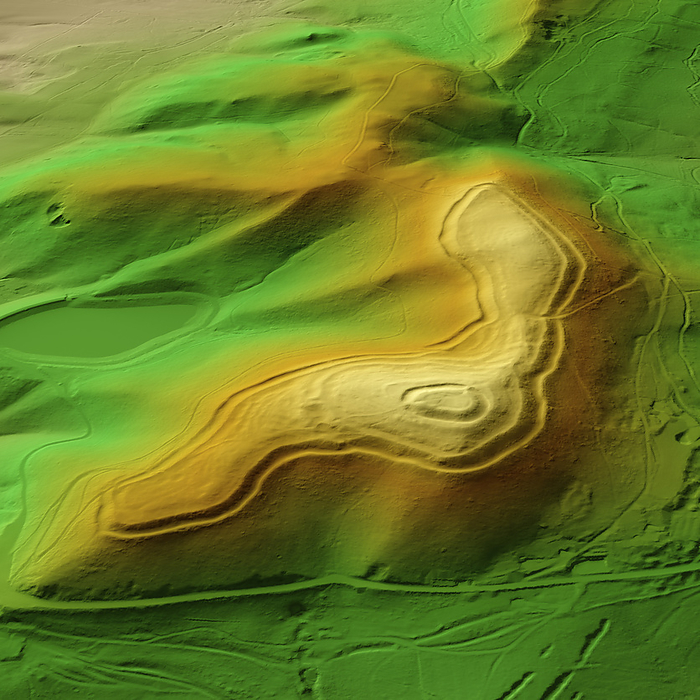 British Camp, UK, 3D LiDAR scan 3D LiDAR scan of British Camp in Herefordshire, UK. The digital terrain model offers a view of the surrounding landscape without obstruction from foliage. This is one of many hillforts found across the UK and dates back to the Iron Age. It is thought to have been first constructed in 200 BCE. These hillforts served as fortified settlements or defensive structures for ancient communities, offering protection and strategic control over the surrounding territory. The height of the summit of British Camp is 338 metres. Image contains UK public sector information licensed under the Open Government Licence v3.0., by SIMON TERREY SCIENCE PHOTO LIBRARY