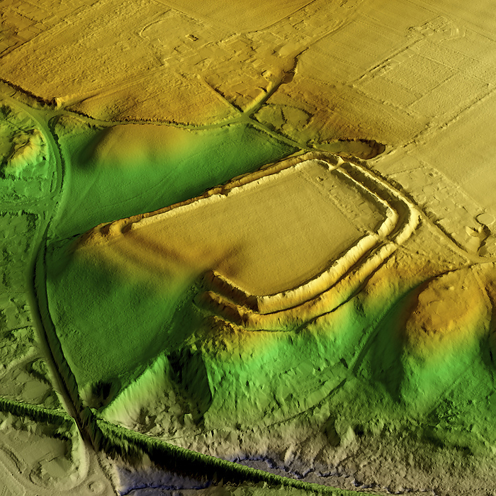 Buckland Rings, UK, 3D LiDAR scan 3D LiDAR scan of Buckland Rings in Hampshire, UK. The digital terrain model offers a view of the surrounding landscape without obstruction from foliage. This is one of many hillforts found across the UK and dates back to the Iron Age, between 800 BCE and 100 CE. These hillforts served as fortified settlements or defensive structures for ancient communities, offering protection and strategic control over the surrounding territory. Image contains UK public sector information licensed under the Open Government Licence v3.0., by SIMON TERREY SCIENCE PHOTO LIBRARY