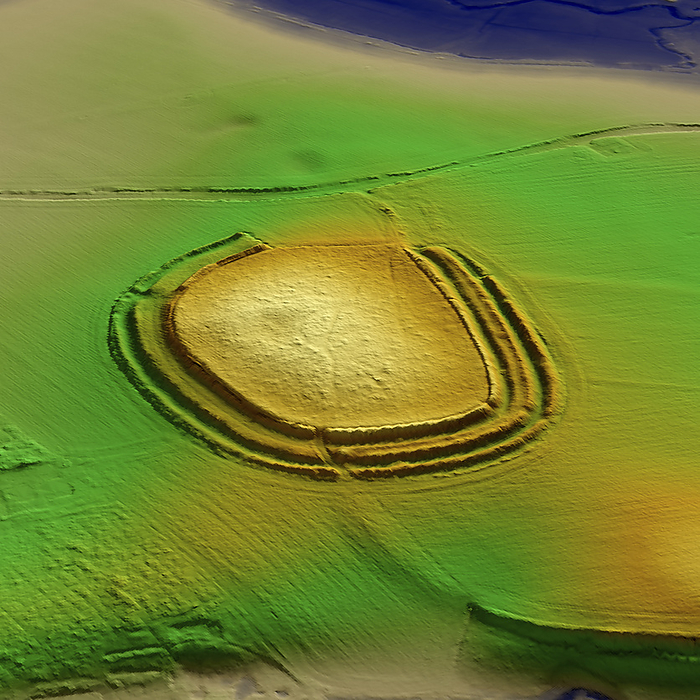 Bullsdown Camp, UK, 3D LiDAR scan 3D LiDAR scan of Bullsdown Camp in Hampshire, UK. The digital terrain model offers a view of the surrounding landscape without obstruction from foliage. This is one of many hillforts found across the UK and dates back to the Iron Age, between the 6th and 1st centuries BCE. These hillforts are typically situated on hilltops and enclosed by earthworks such as ramparts and ditches. They served as fortified settlements or defensive structures for ancient communities, offering protection and control over the surrounding territory. Image contains UK public sector information licensed under the Open Government Licence v3.0., by SIMON TERREY SCIENCE PHOTO LIBRARY