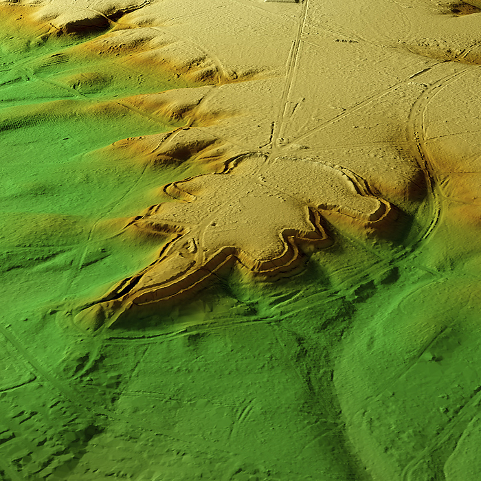 Caesar s Camp Iron Age hillfort, Berkshire, 3D LiDAR scan 3D LiDAR scan of Caesar s Camp, an Iron Age hillfort in Berkshire, UK. The digital terrain model offers a view of the surrounding landscape without obstruction from foliage. Hillforts were settlements constructed on natural hills, typically fortified with earthworks around the contours of the hill. They were widely constructed across Europe, Britain and Ireland in the centuries preceding the Roman conquest of the regions. Caesar s Castle is an unusually shaped hillfort enclosing an area of around 70,000 square metres, making it one of the largest in the region. Despite its name it was constructed centuries before Julius Caesar s invasion of Britain in 55 BCE. Image contains UK public sector information licensed under the Open Government Licence v3.0., by SIMON TERREY SCIENCE PHOTO LIBRARY
