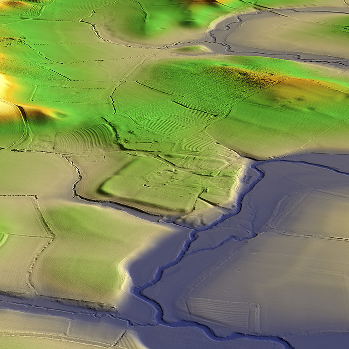 Wappenbury Camp, UK, 3D LiDAR scan 3D LiDAR scan of Wappenbury Camp in Warwickshire, UK. This digital terrain model reveals the site hidden by foliage and the disrupted pattern of the landscape. This ancient hillfort is one of many found across the UK and dates back to the Iron Age, roughly between 700 BC and 43 AD. These hillforts served as fortified settlements or defensive structures for ancient communities, offering protection and strategic control over the surrounding territory. Wappenbury Camp occupies a prominent position on a natural knoll or plateau above the river channel. Image contains UK public sector information licensed under the Open Government Licence v3.0., by SIMON TERREY SCIENCE PHOTO LIBRARY