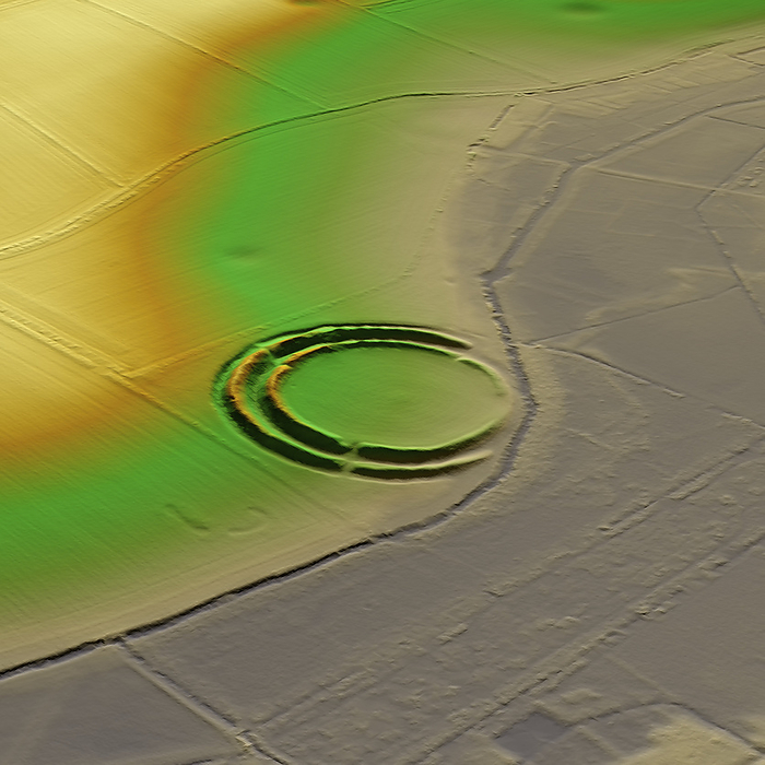 Warham Camp, UK, 3D LiDAR scan 3D LiDAR scan of Warham Camp in Norfolk, UK. This digital terrain model reveals the site hidden by foliage and the disrupted pattern of the landscape. This ancient hillfort is one of many found across the UK and dates back to the Iron Age, roughly between 700 BC and 43 AD. These hillforts served as fortified settlements or defensive structures for ancient communities, offering protection and strategic control over the surrounding territory. Warham Camp is a circular structure with an overall diameter of 212 metres. Iron Age and Roman pottery sherds have been recovered in the site. Image contains UK public sector information licensed under the Open Government Licence v3.0., by SIMON TERREY SCIENCE PHOTO LIBRARY