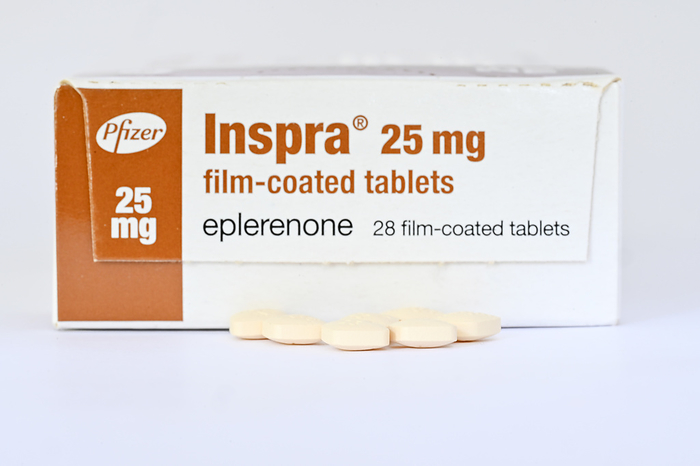 Eplerenone cardiology drug Eplerenone cardiology drug. Box containing tablets of eplerenone, marketed under the name Inspra. Eplerenone is an aldosterone antagonist used as an adjunct in the management of chronic heart failure., by DR P. MARAZZI SCIENCE PHOTO LIBRARY