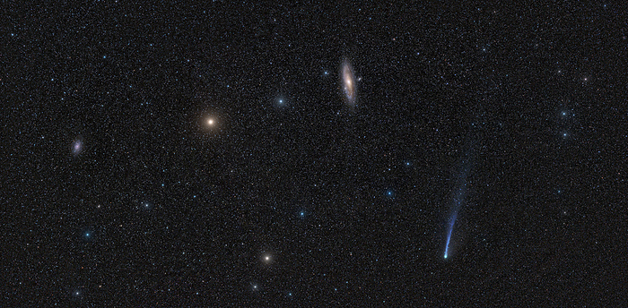 Comet 12P Pons Brooks and galaxies, 2024 Comet 12P Pons rooks  blue, bottom right , the Andromeda galaxy  centre right , Triangulum galaxy  left  and Mirach  yellow star, centre left  photographed on 4 March 2024 from Slovakia. Pons Brooks is only visible for a short time every 71.2 years, which is the length of time it takes to orbit the Sun. It was first discovered in 1812 by Louis Pons, and is estimated to be around 30 km in diameter. Comets are collections of dust and ice that orbit the Sun. As they near the Sun and are warmed they release gas  outgassing  that forms the tail., by PETR HORALEK SCIENCE PHOTO LIBRARY
