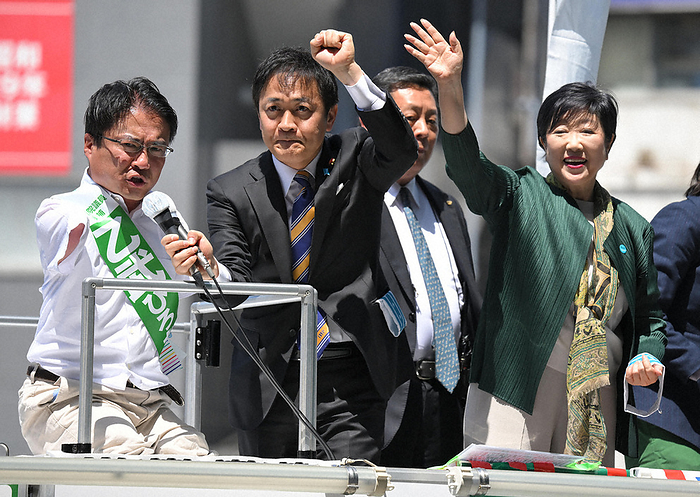 Tokyo 15th House of Representatives by election announced Hirotada Otome  left  gives a speech on the street. In the center is Yuichiro Tamaki, representative of the Democratic Party of Japan, and on the right is Tokyo Governor Yuriko Koike, in Koto ku, Tokyo, April 16, 2024, at 11:34 a.m. Photo by Toshiki Miyama