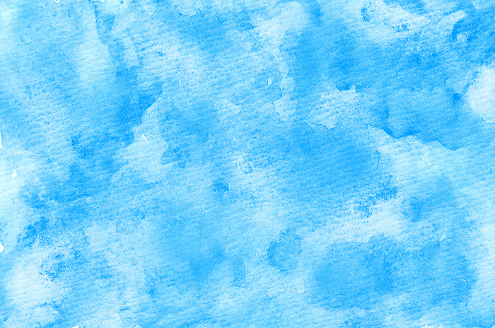 Rough textured paper background oozing watercolor, blue.