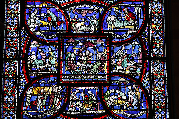 Canterbury cathedral, Kent, U.K. Stained glass. Becket miracle window, Trinity chapel ambulatory. Detail : the plague in the house of Jordan Fitz Eisulf Stained glass detail of the Plague in the House of Jordan Fitz Eisulf, Becket miracle window, Trinity Chapel ambulatory, Canterbury Cathedral, UNESCO World Heritage Site, Canterbury, Kent, England, United Kingdom, Europe, by Godong