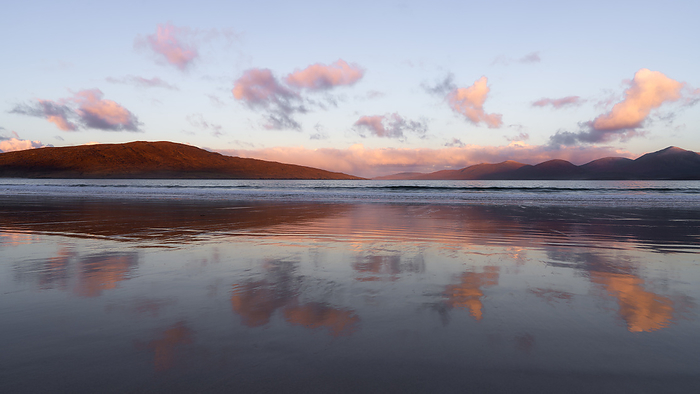 Sunrise over the island of Taransay and the North Harris hills from Luskentyre Beach, Isle of Harris, Outer Hebrides, Scotland, United Kingdom, Europe Sunrise over the island of Taransay and the North Harris hills from Luskentyre Beach, Isle of Harris, Outer Hebrides, Scotland, United Kingdom, Europe, by Karen Deakin