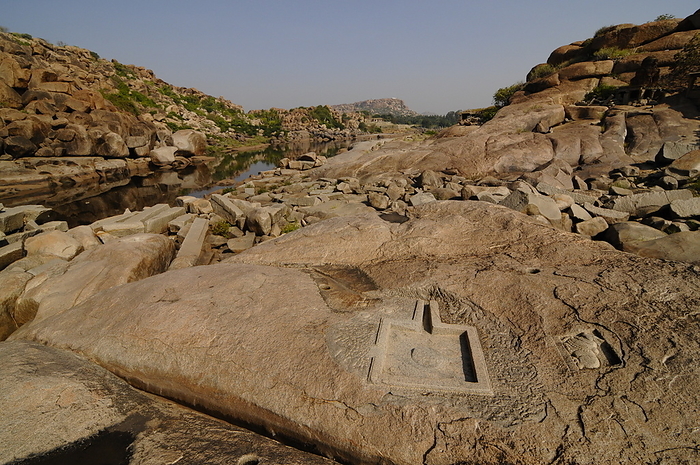 Tungabhadra river and stone cut Shiva Linga, Hampi, India Tungabhadra River and stone cut Shiva Linga, Hampi, Karnataka, India, Asia, by Michael Szafarczyk