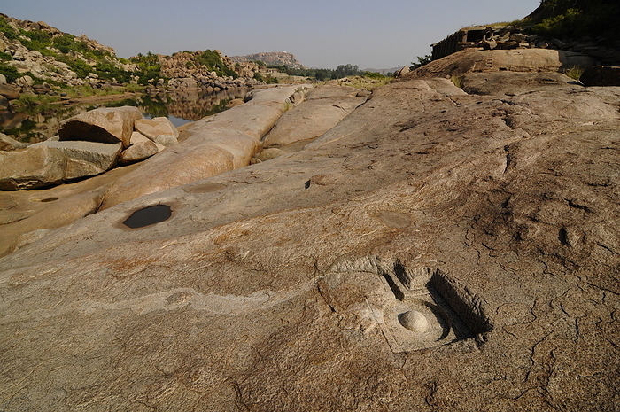 Tungabhadra river and stone cut Shiva Linga, Hampi, India Tungabhadra River and stone cut Shiva Linga, Hampi, Karnataka, India, Asia, by Michael Szafarczyk