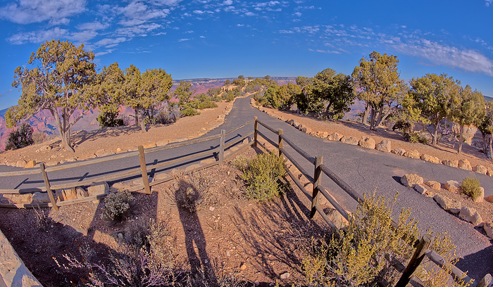The divided paved entry pathway to the Powell Memorial from the parking lot off of Hermit Road at Grand Canyon Arizona. The divided paved entry pathway to the Powell Memorial from the parking lot off Hermit Road, Grand Canyon, Arizona, United States of America, North America, by Steven Love