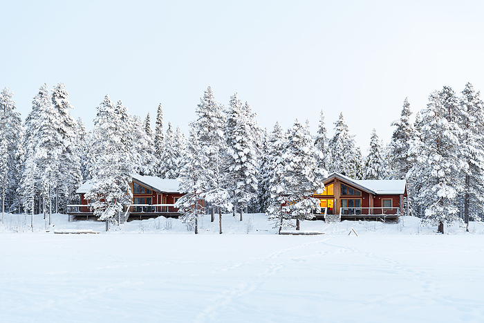 Winter view of a mountain lodge surrounded by frozen forest covered with snow in the swedish lapland, Sweden, Scandinavia, Europe Winter view of a mountain lodge surrounded by frozen forest covered with snow in Swedish Lapland, Sweden, Scandinavia, Europe, by Paolo Graziosi