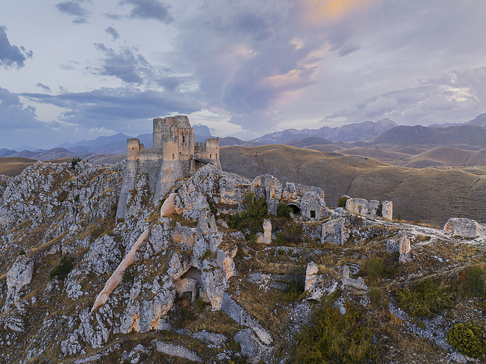 aerial view taken by drone of Rocca Calascio castle during an autumn sunrise, National Park of Gran Sasso and Monti of Laga, Abruzzo, Italy, Europe Aerial view taken by drone of Rocca Calascio castle during an autumn sunrise, National Park of Gran Sasso and Monti of Laga, Abruzzo, Italy, Europe, by carlo alberto conti