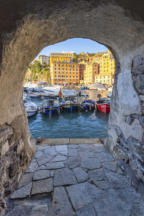 the beautiful harbour of Camogli seen from an house arch, Genova province, Liguria, Italy, Europe The beautiful harbour of Camogli seen through a house arch, Camogli, Genova province, Liguria, Italy, Europe, by carlo alberto conti