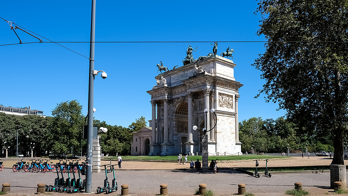 View of Porta Sempione   Simplon Gate   and the Arco della Pace   Arch of Peace   in Milan, Italy. The 19th century triumphal arch, with roots in a Roman gate, serves as a distinctive symbol of the area. View of Porta Sempione  Simplon Gate  and Arco della Pace  Arch of Peace , 19th century triumphal arch with Roman roots, Milan, Lombardy, Italy, Europe, by MLTZ