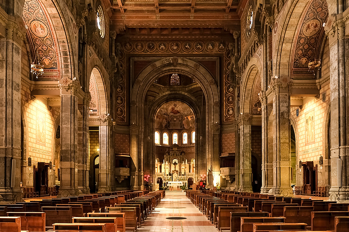 Interior of Corpus Domini church in Milan, Northern Italy. Elevated to minor basilica status by Pope Pius XII, the church, blending Neoromanesque, Neobyzantine, and Art Nouveau styles, was completed in 1901. Interior of Corpus Domini Church, blending Neo Romanesque, Neo Byzantine, and Art Nouveau styles, completed in 1901, elevated to minor basilica status by Pope Pius XII, Milan, Lombardy, Italy, Europe, by MLTZ