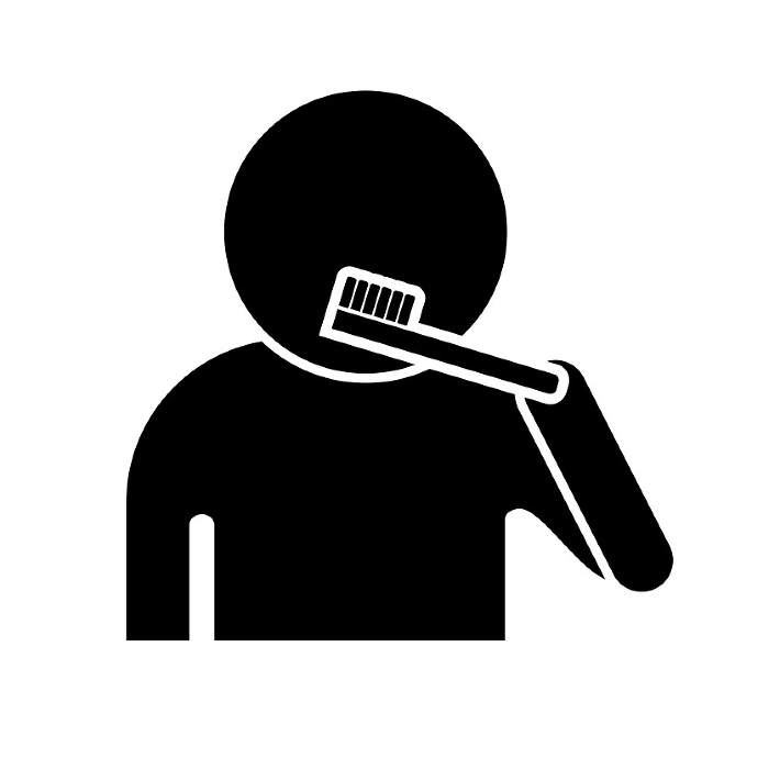 Silhouette icon of a person brushing his teeth. Vector.
