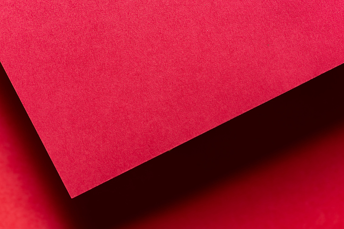 Overlapping red drawing paper background