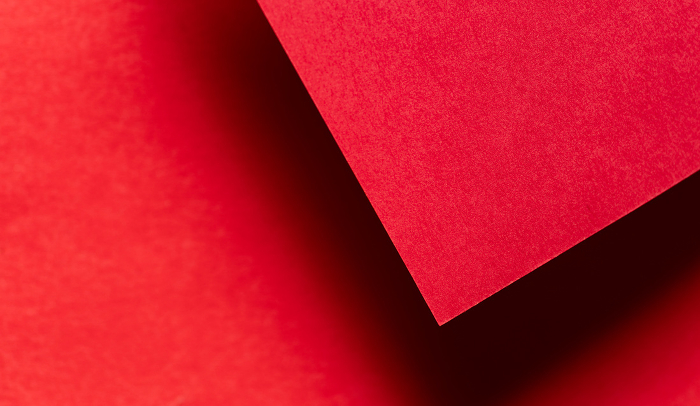 Overlapping red drawing paper background